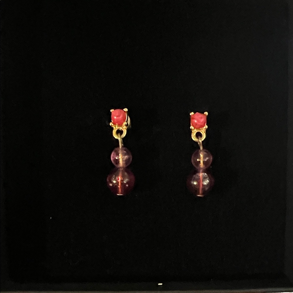 Five pairs of earrings.